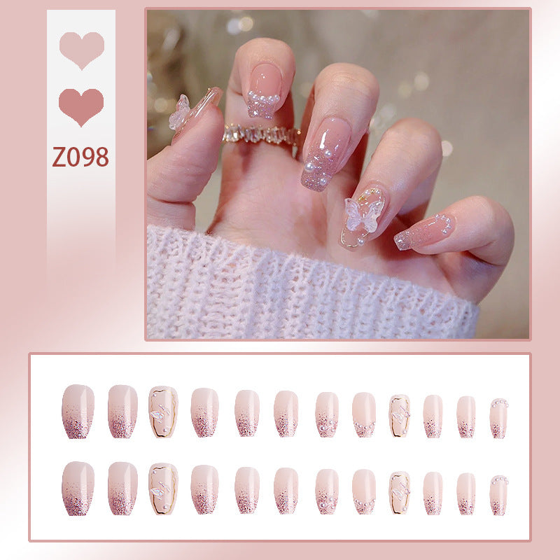 Kunstnagelset mit eleganten Glitzerverzierungen und schimmernden Akzenten Brehn
