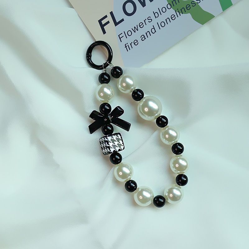 Elegante Perlen- und schwarze Perlen-Charm-Armband Brehn