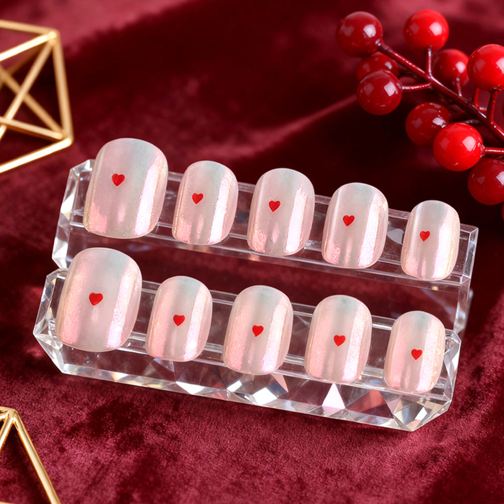 Herz-verzierte Gel-Nagelkunst Brehn