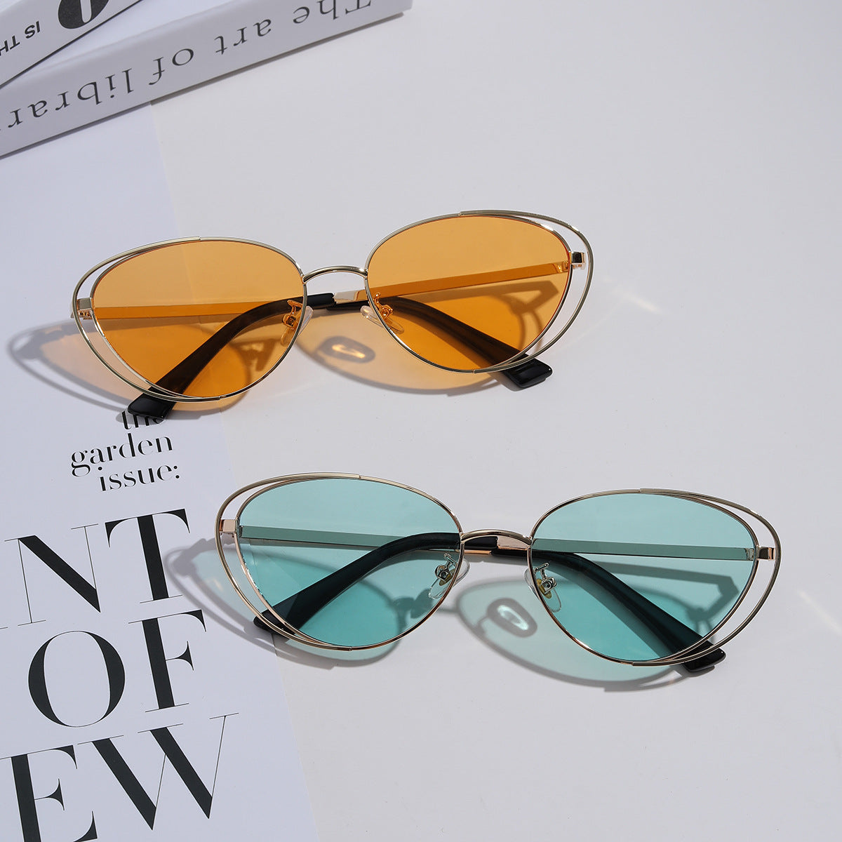 Damen geometrische Sonnenbrille mit rotem Glas und elegantem Metallrahmen Brehn