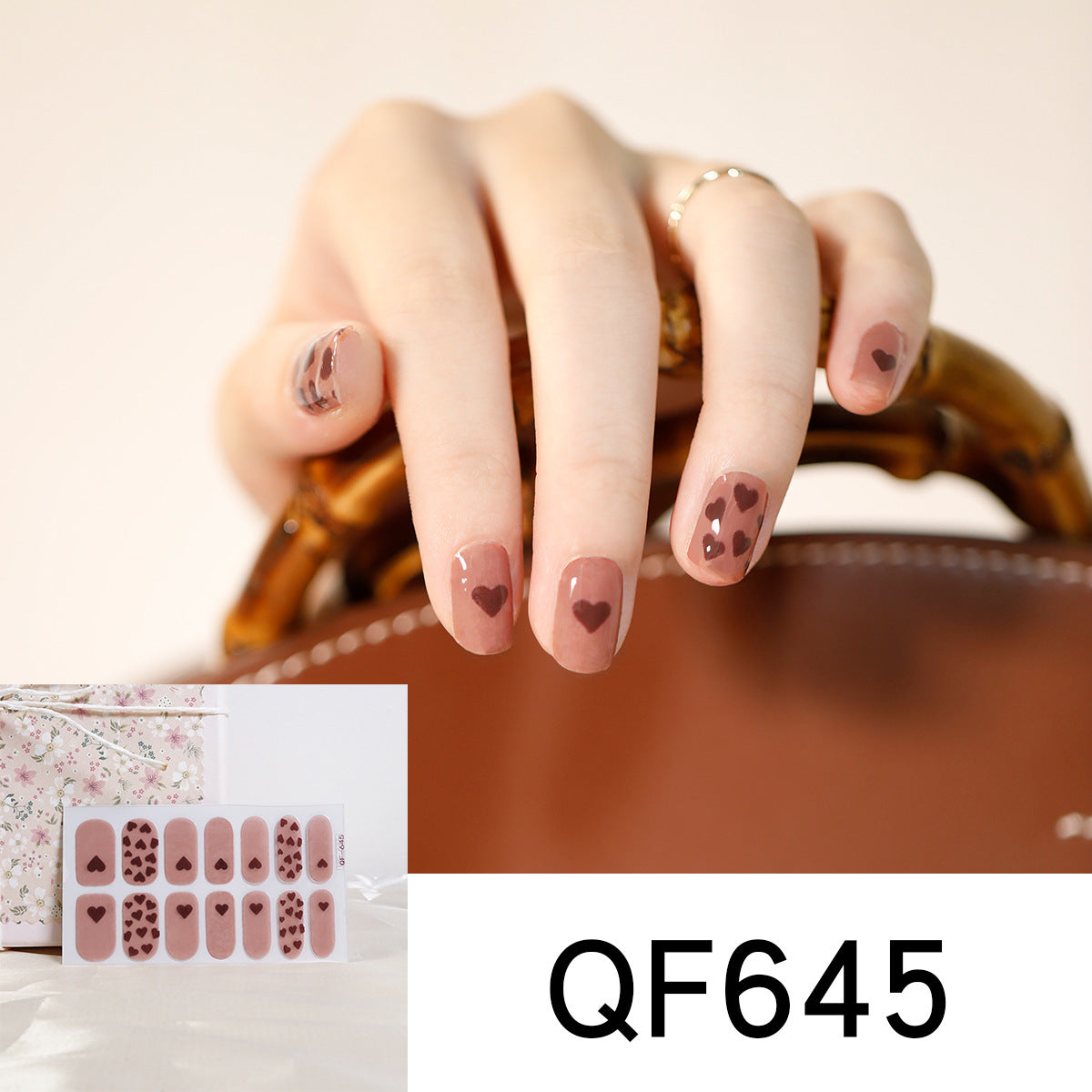 Künstliche Nagelgestaltung mit Herz-Motiv Brehn
