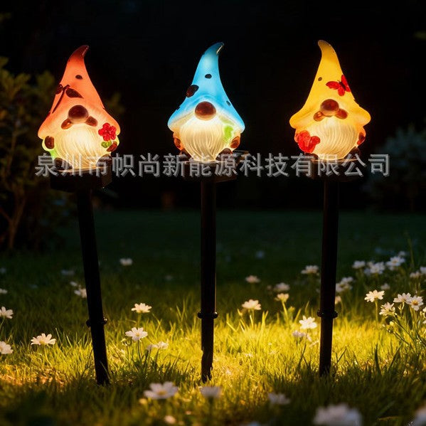 Verspielte solarbetriebene Eichhörnchen-Gartensteckerlampe mit integriertem Solarpanel und warmem LED-Glühen Brehn