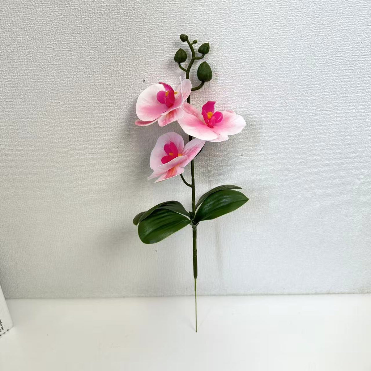 Künstliches Orchideenblütenarrangement für dekorative Wohnraumausstellung