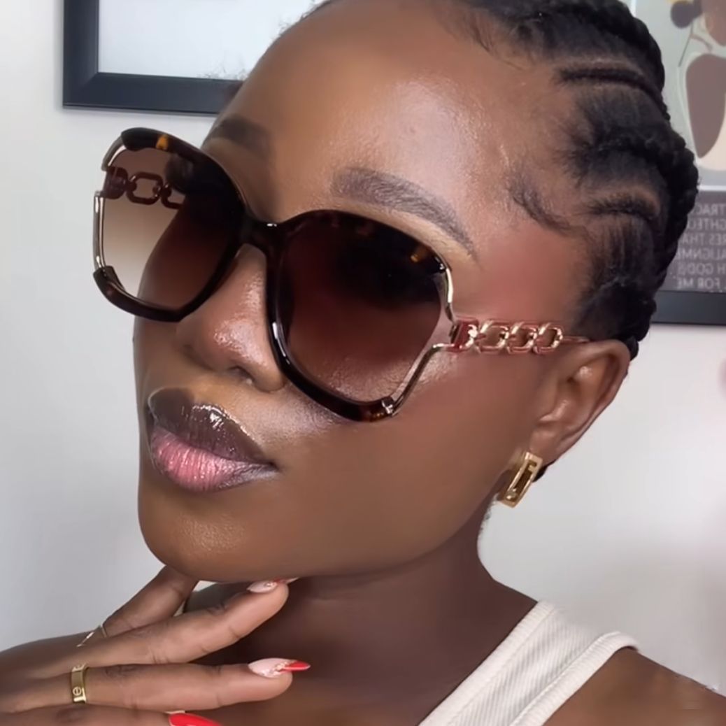 Damen modische Sonnenbrille mit goldenen Kettendetails Brehn