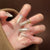 Elegante Glitzerpress-on-Nagelerweiterungen Brehn