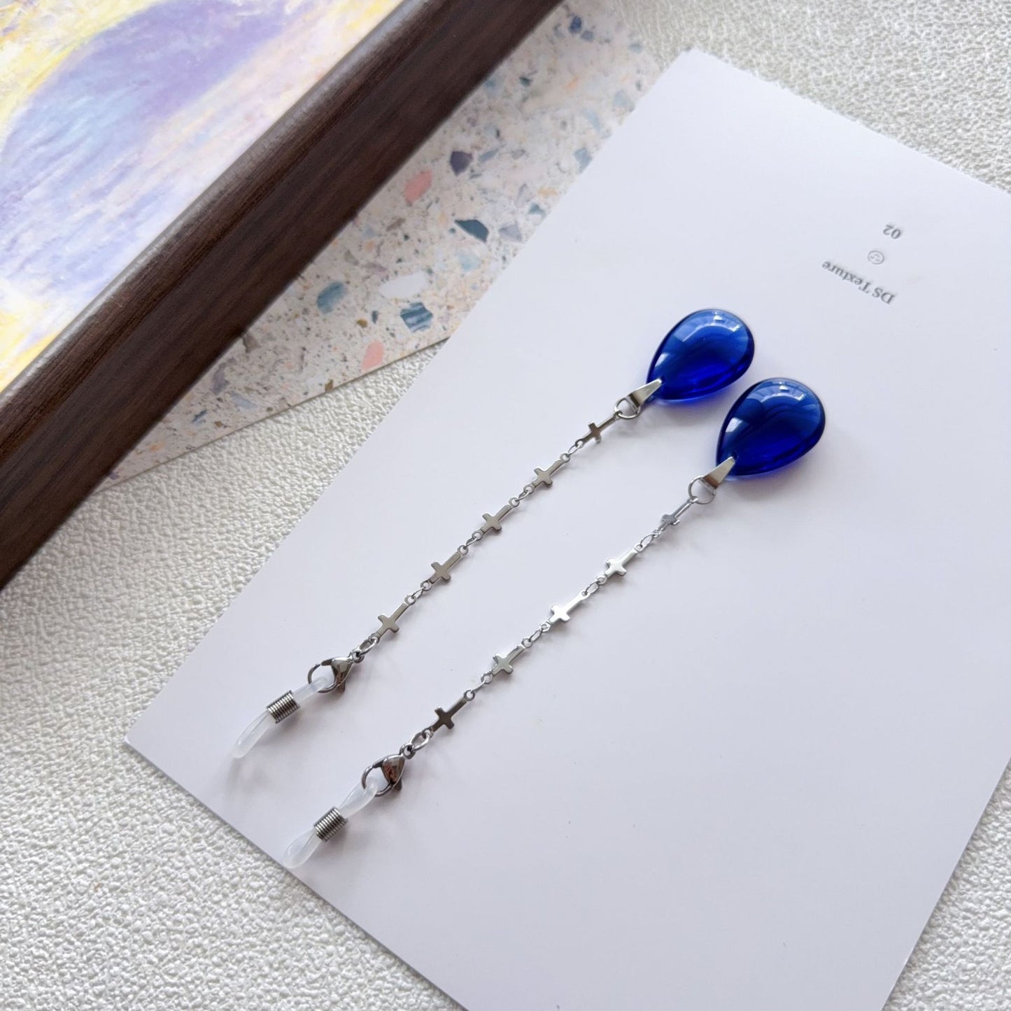 Elegante Tropfenohrringe mit Kettendetail Brehn