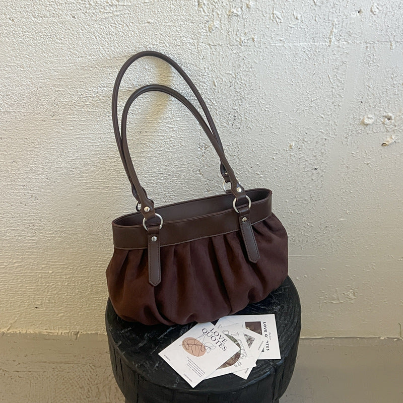Geraffte Wildleder-Handtasche