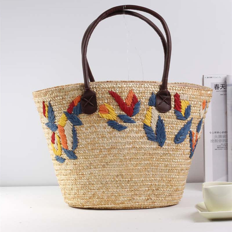 Geflochtene Strandtasche mit Farbenfrohem Stickmuster Brehn