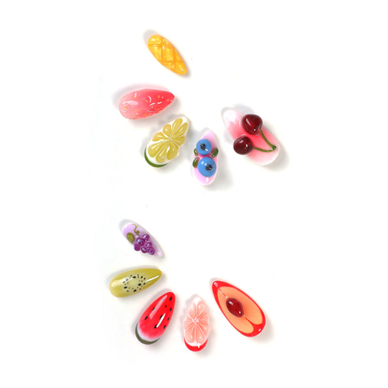Kreatives Kunstnagelset mit bunten Obstdesigns Brehn