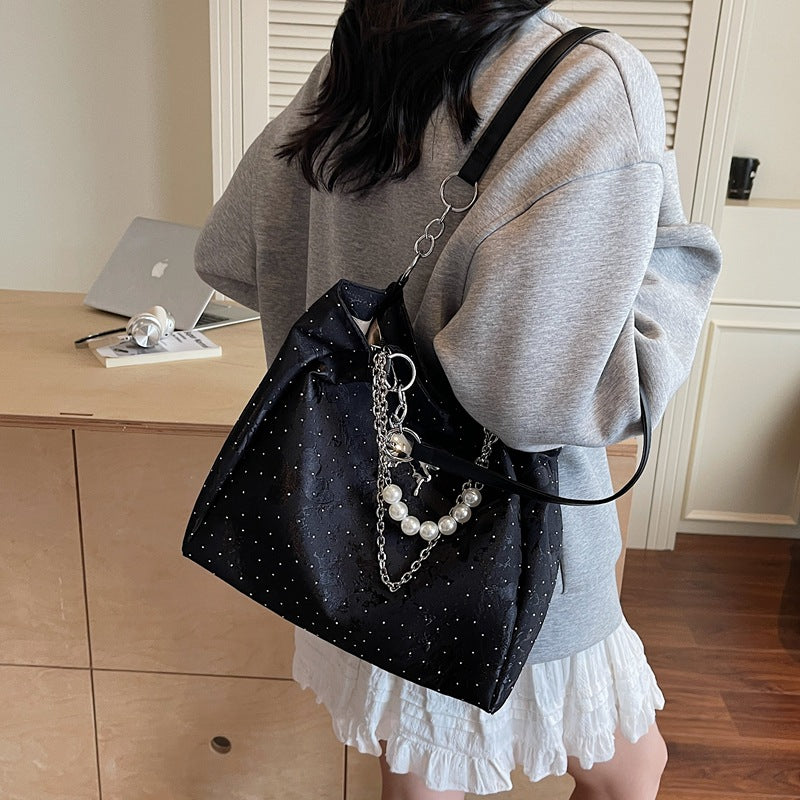 Elegante Handtasche mit Perlendetails Brehn