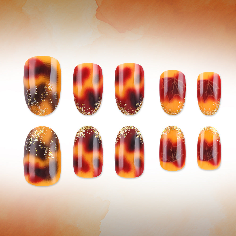 Künstlerisches Press-On-Nagelset mit Herbstblatt-Design Brehn