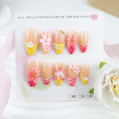 Kunstnagelset mit kreativen Blumen- und Spitze Verzierungen Brehn