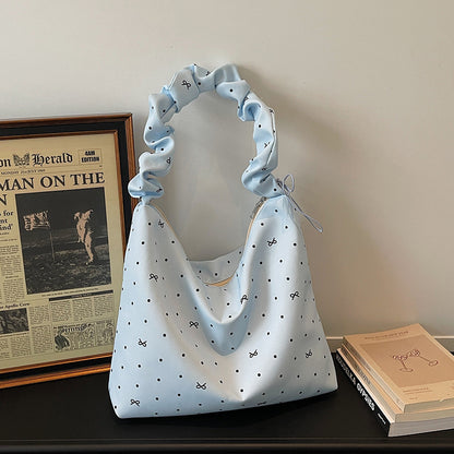 Lässige gepunktete schlabberige Handtasche