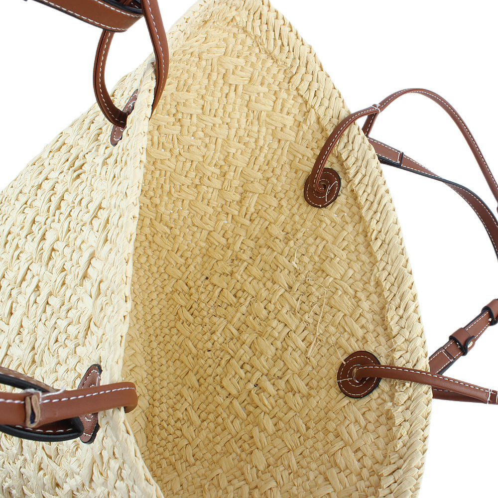 Elegante Handtasche Aus Geflochtenem Naturmaterial mit Robusten Ledergriffen Brehn