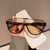 Damen futuristische Sonnenbrille im sportlichen Design Brehn