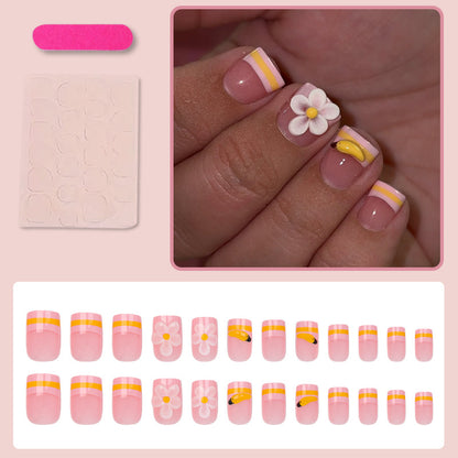 Kunstnagelset mit verspielten Blumen- und Fruchtmotiven Brehn