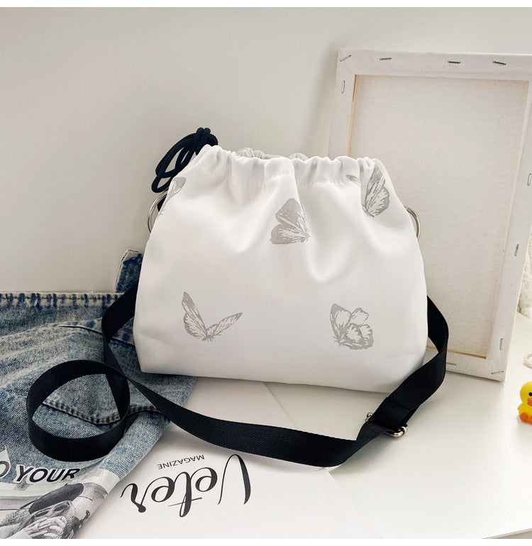 Elegante Drawstring Schmetterlingsdruck Handtasche