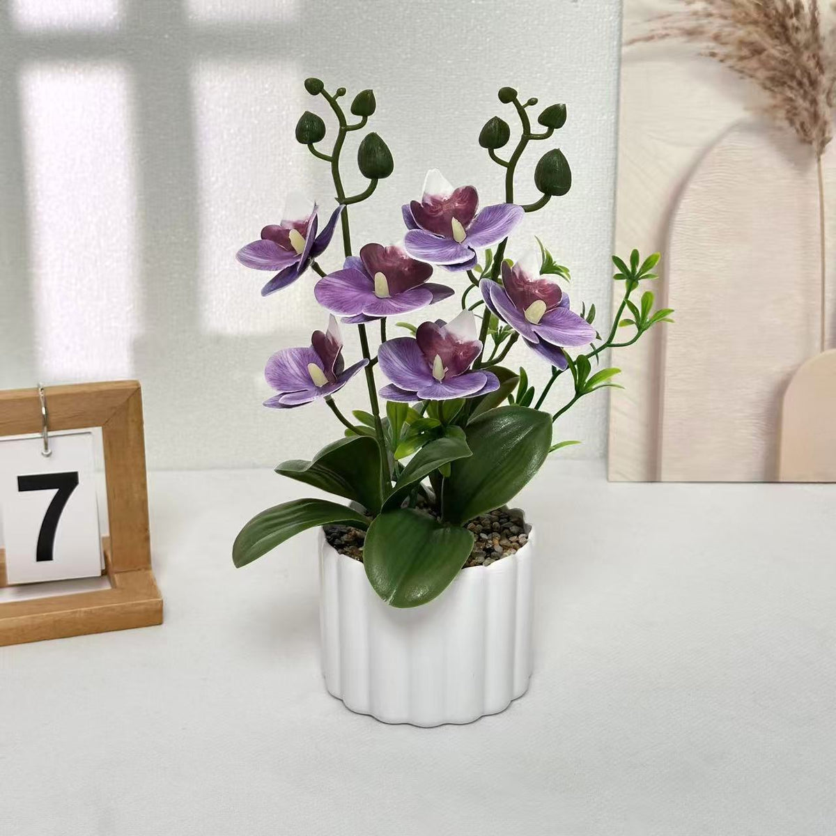 Lebensechte künstliche Orchideenpflanzenanordnung für die Wohnraumpräsentation
