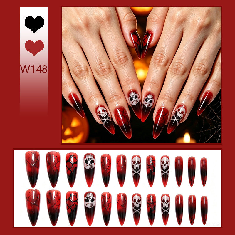 Kunstnagelset mit Halloween-Motiven und eleganten Akzenten Brehn