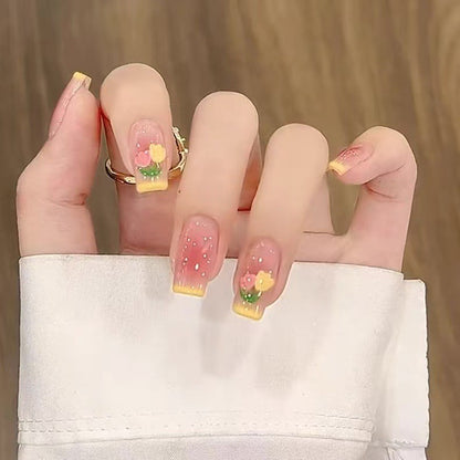 Kunstvolle Nagelset mit 3D-Blumen- und Schleifendetails Brehn