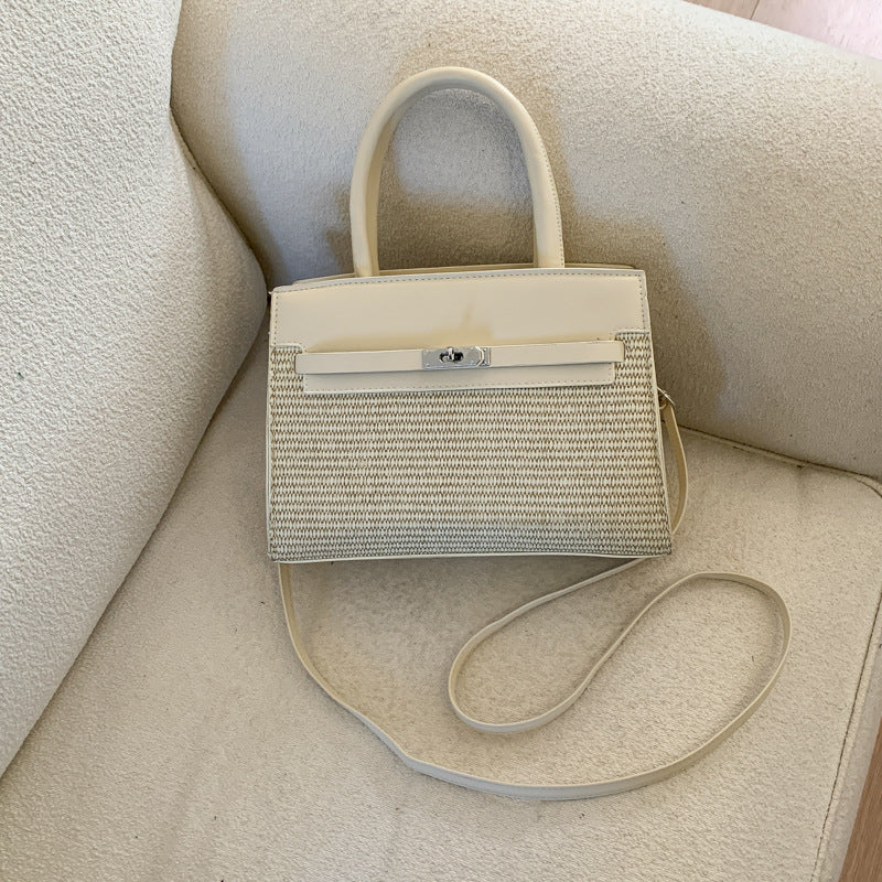 Elegante gewebte Handtasche mit abnehmbarem Schulterriemen