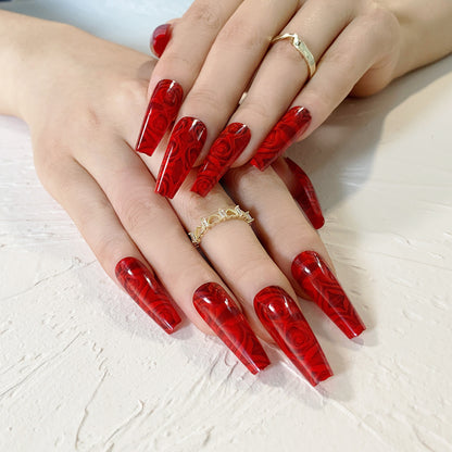 Kunstvolle Stiletto-Nägel mit floralem 3D-Design Brehn