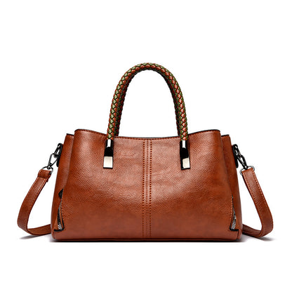 Elegante geflochtene Handtasche Brehn
