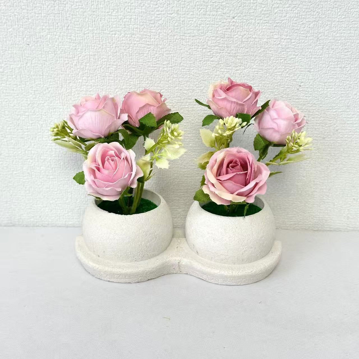 Elegante Blumenpflanzanordnung
