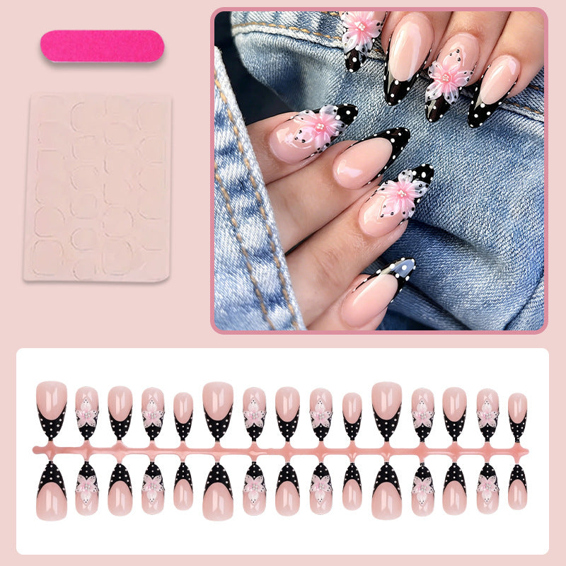 Kunstnagelset mit eleganten 3D-Blumen und stilvollen Punkten Brehn