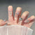 Elegante Dekorative Press-On Nagelkunst Brehn