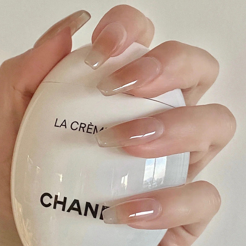 Kunstnagelset mit elegantem French-Tipp und Glitzerakzenten Brehn