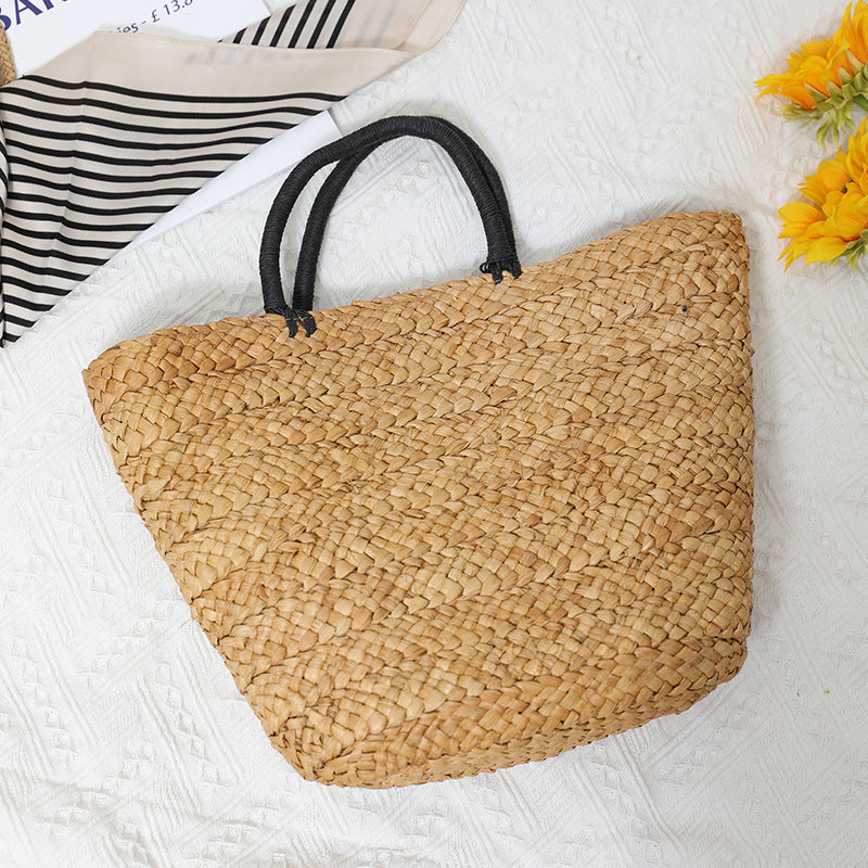 Elegante Basttasche mit Kontrastgriffen Brehn