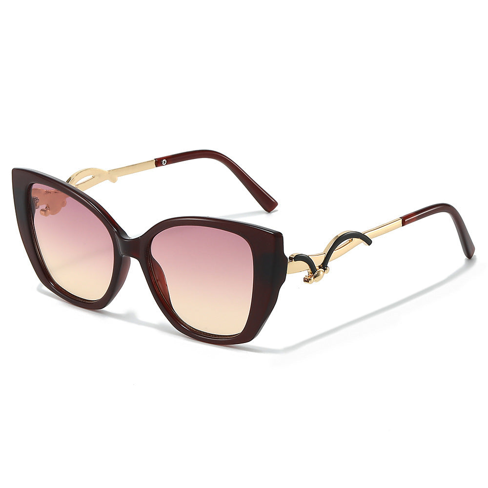 Übergroße Geometrische Katzenaugen-Sonnenbrille mit goldenen Akzenten Brehn