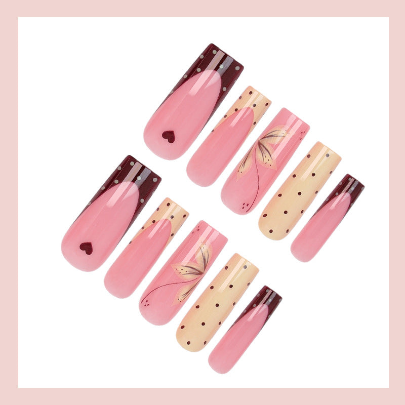 Kunstnagelset mit eleganten floralem und polka Dots Design Brehn