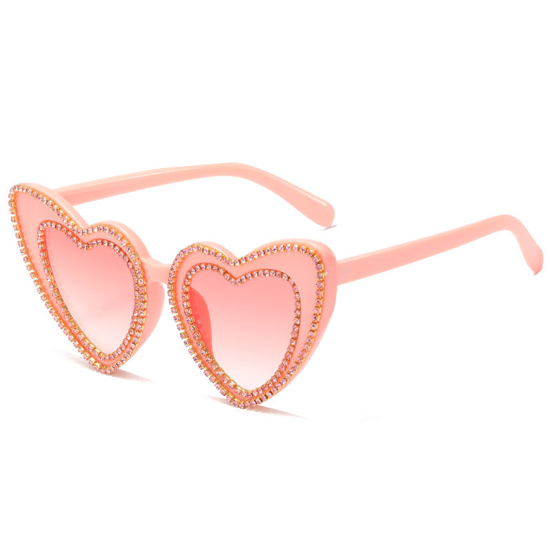 Damen Herzförmige Sonnenbrille mit Glitzerakzenten Brehn