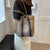 Geflochtene Strandtasche mit Fransigen Details Brehn