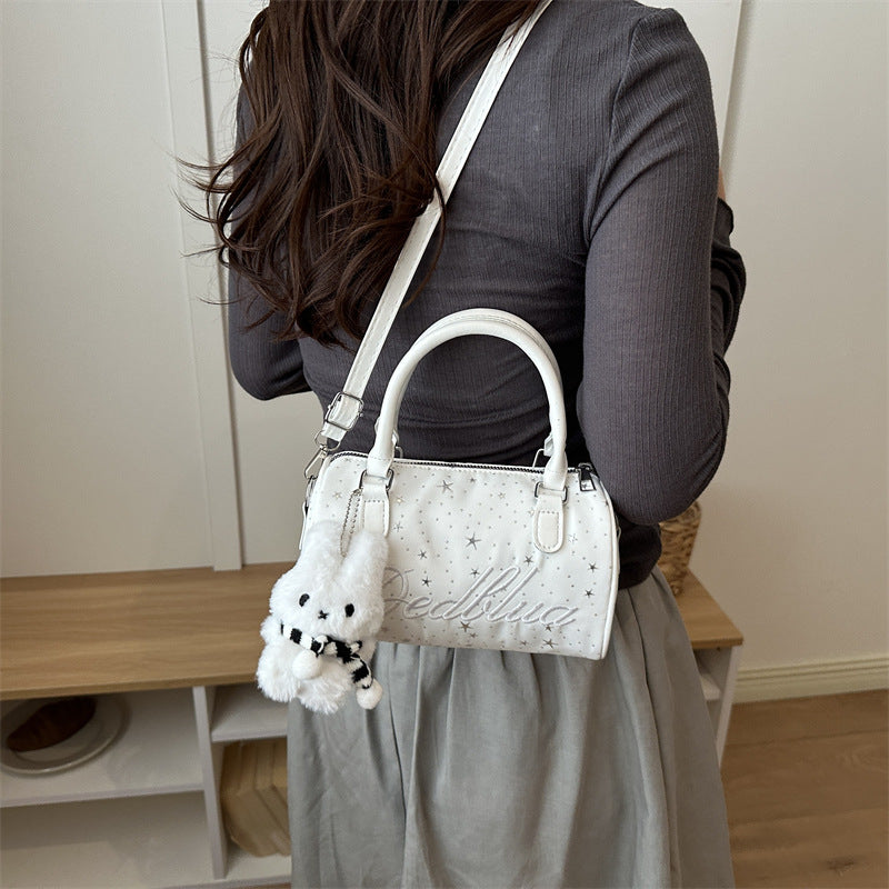 Stylische mit Sternen verzierte Handtasche