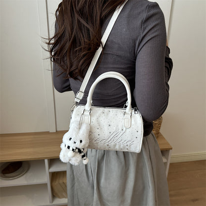 Stylische mit Sternen verzierte Handtasche