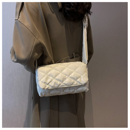 Elegante gesteppte Umhängetasche