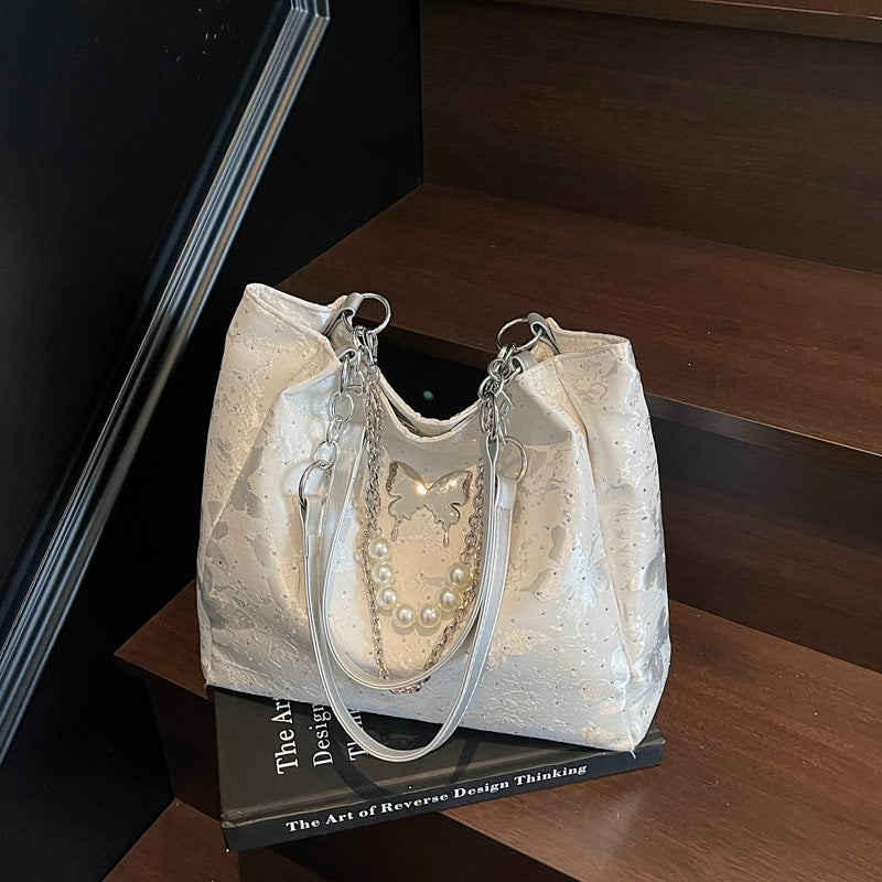 Elegante Handtasche mit Perlendetails Brehn