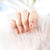 Künstlerisches Kirschblüten Press-On Nagelset Brehn