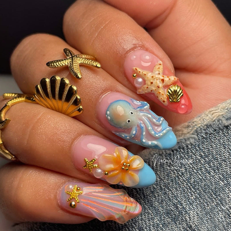 Dekoratives Press-On Nagelkunst-Set mit von Sommer inspirierten Ozeandesigns Brehn