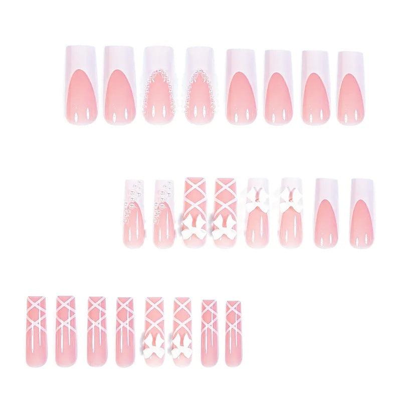 Kunstnagelset mit eleganten 3D- Schleifen und Perlenverzierungen Brehn