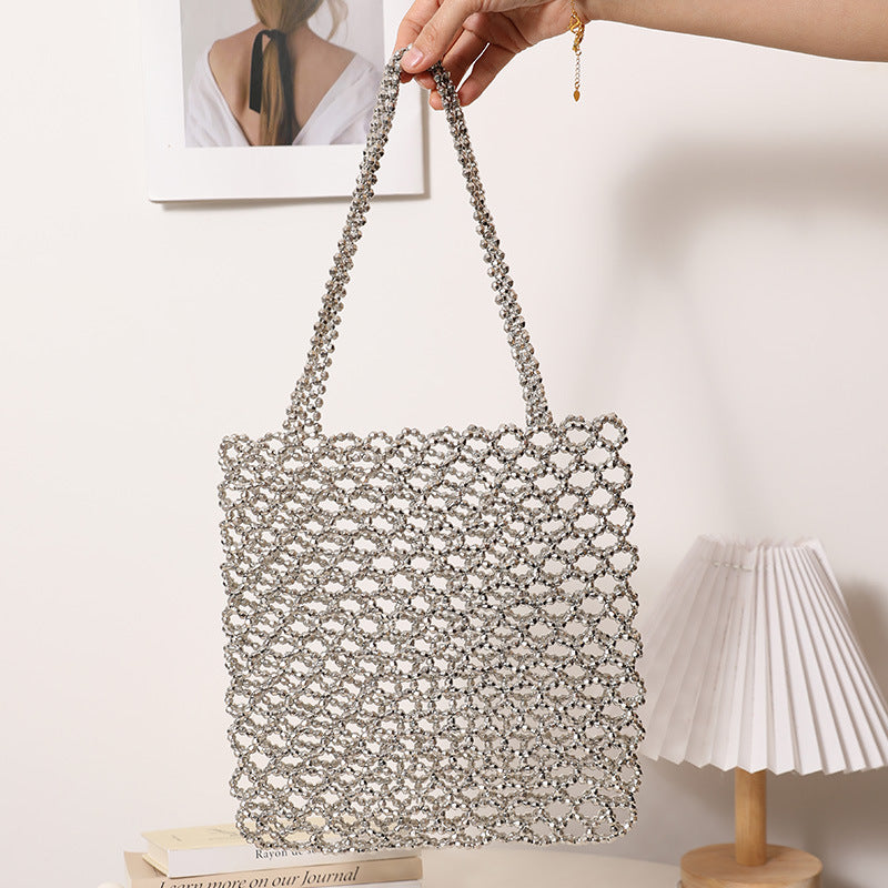 Glitzernde Netzhandtasche Aus Geflochtenem Material Brehn