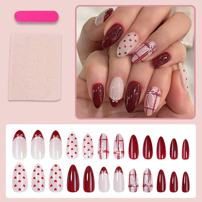 Kunstnagelset mit verspielten Herzen und eleganten Schleifen Brehn