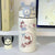 Damen Isoliertrinkflasche mit sicherem Klappverschluss und niedlichem Design Brehn