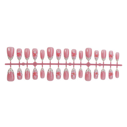Kunstnagel-Set mit floralen Designs und Glitzerakzenten Brehn