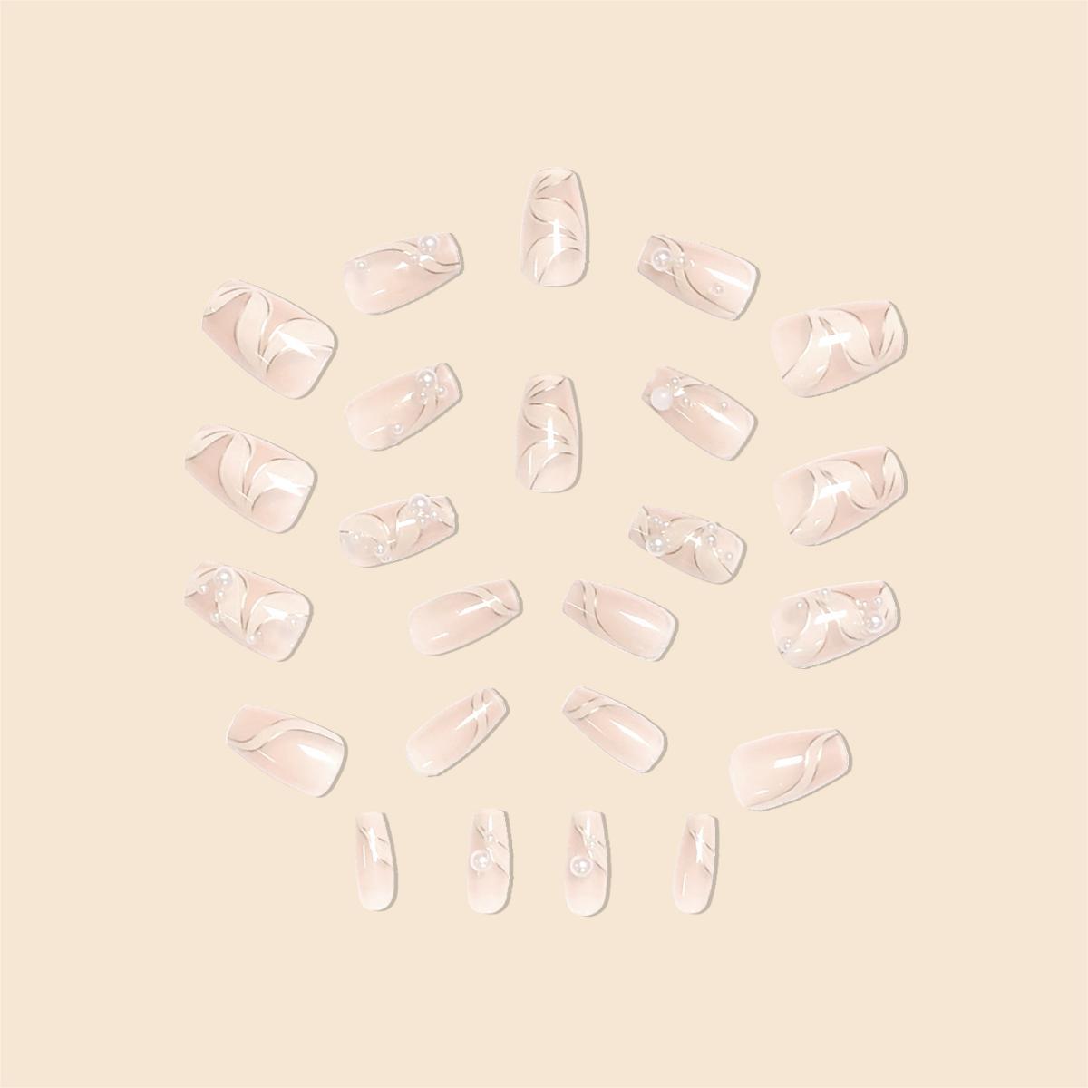 Elegante mit Perlen verzierten Acryl-Nagelverlängerungen