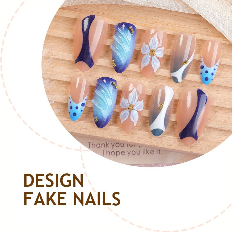Kunstnagelset mit handgefertigten blumigen Motiven und elegantem Glitzer Brehn