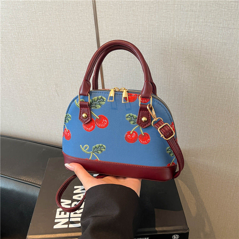 WoBestickte Kirschmuster-Handtasche Brehn